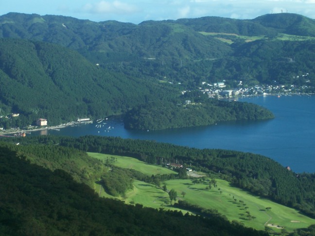  View of lake and golf course while descending in cable car