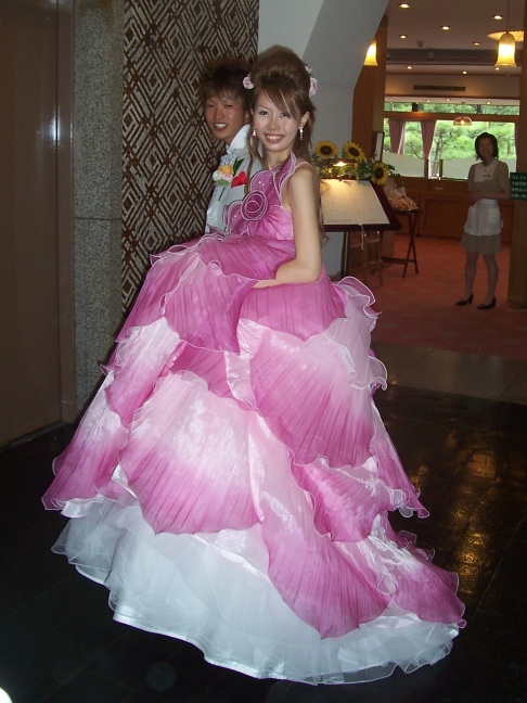  This bride has already changed from the elegant kimono she wore for the ceremony