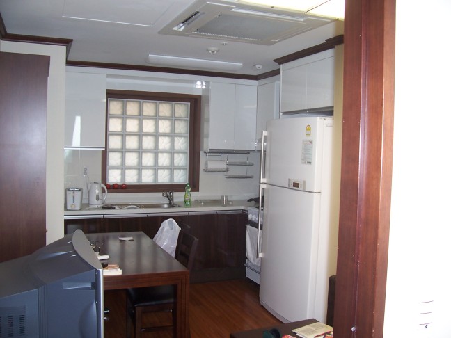 Kitchen as seen through living room.