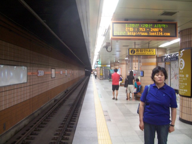 Waiting for the subway train.