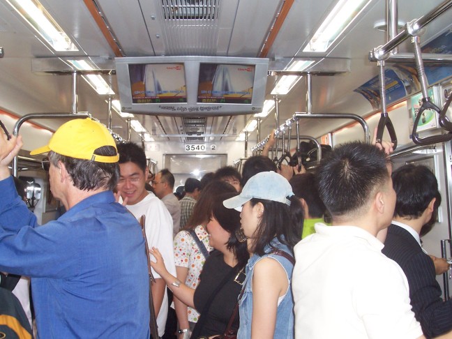 Inside a subway car. (TVs are actually rare.)