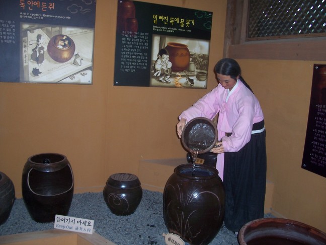 She tips and pours a new bucket of water every six seconds, yet the jar never fills.