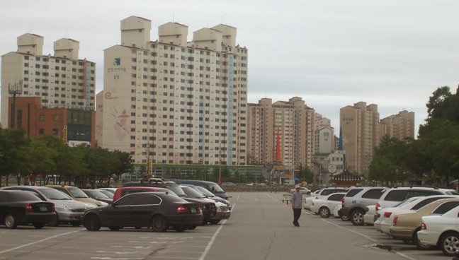 More apartments line the village's parking lot.