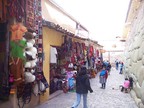  Modern shops opposite an ancient wall