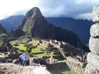  Religious area on the left, worker area on the right, and Huayna Picchu in the distance; from city gate area, Machu Picchu