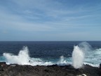  Blow hole and wave in a duet, Punta Suarez, Espanola, Galapagos