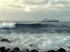  A much bigger tour boat moored beyond the waves at Punta Suarez, Espanola, Galapagos 
