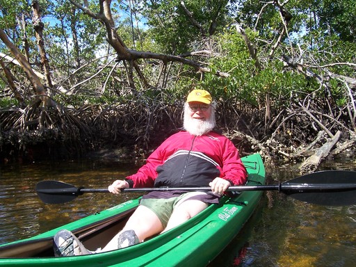 Fred relaxes in his kayak. The 30 SPF goo preserved the whiteness of his limbs.