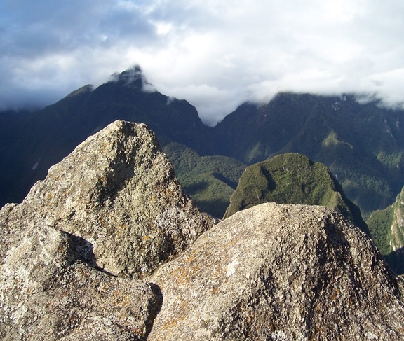 Carved rocks mimic the mountains (Putukusi on the left), Observatory, Machu Picchu