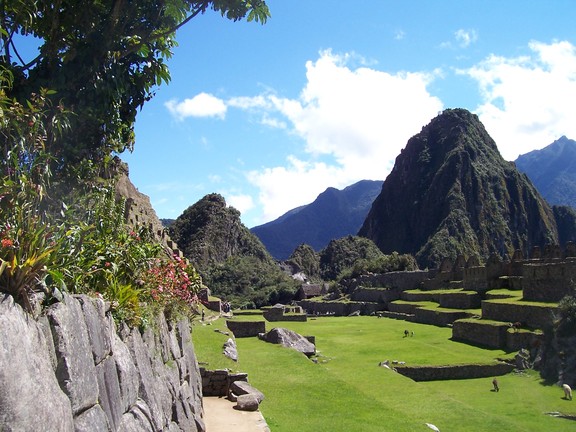 Wayna Huayna Picchu and Huayna Picchu seen across the main lawn of Machu Picchu