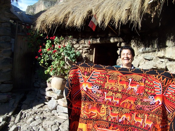 Brilliant red hangings for sale; Ollantaytambo