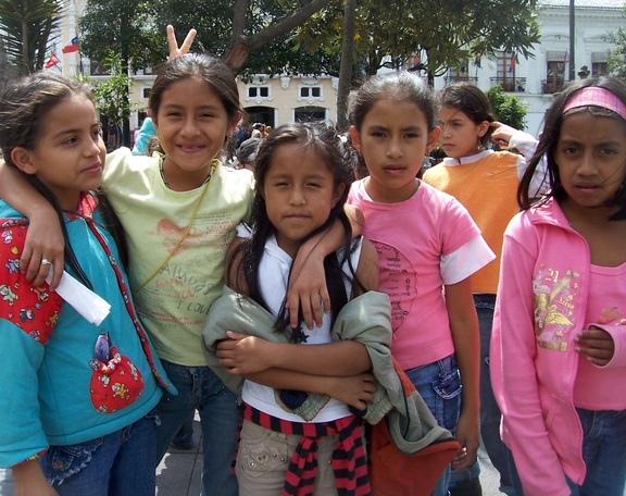 Six schools girls on a school outing at Independence Square, Quito