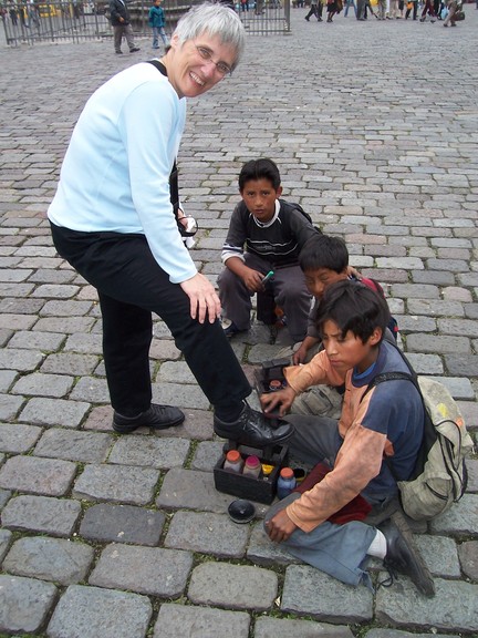 Sarah and I got our shoes shined for a buck, total, in Independence Square, Quito