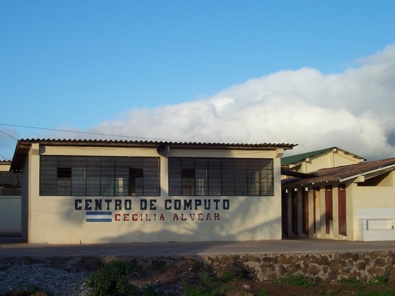 Empty building with sign suggesting it is part of a school fostered by Cecilia Alvear, San Cristobal, Galapagos