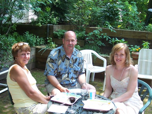 Conversing in the garden: Shirley, Brian, and Ellyn