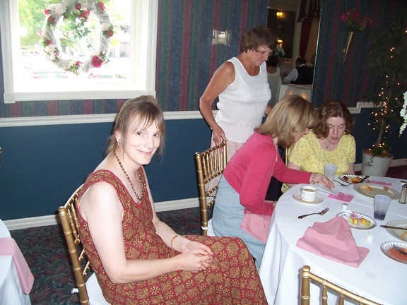 Aunt Karen has a big smile; Shirley, Ellyn, and Rebecca check out the hand stamped napkins