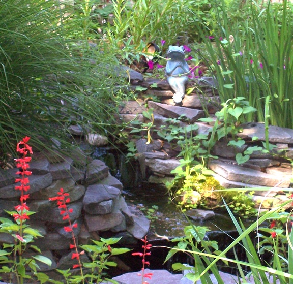 Bronze frog lounging in the garden at Laurel Villa Country Inn, Milford PA