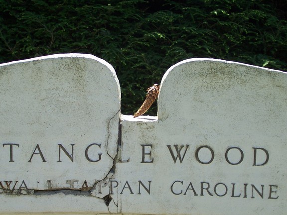 The dedication stone in Tanglewood's formal garden is showing its age