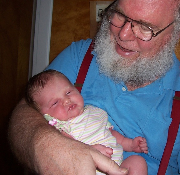 Grandpa cradles Lindsay
