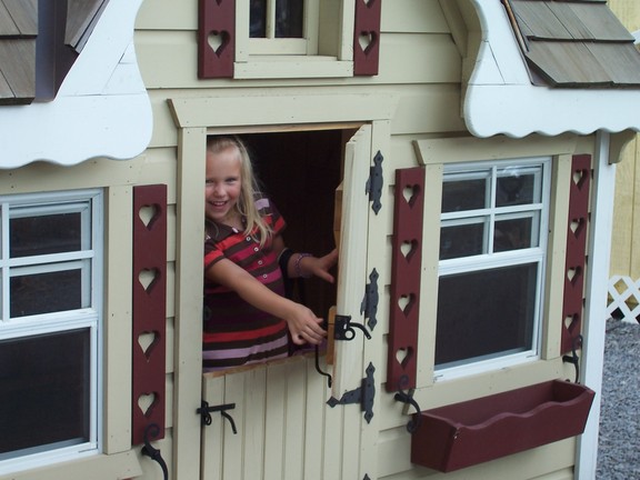 These playhouses are for sale. Guess who wants one.