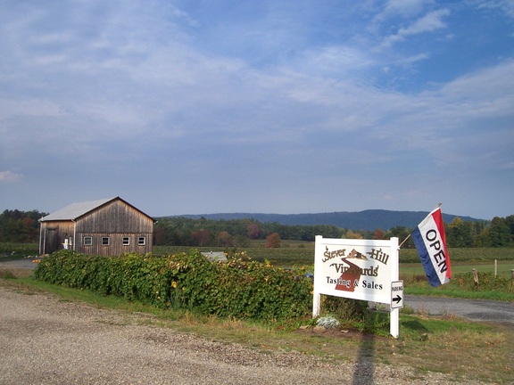The Steverhill Winery sign and main barn with tasting room