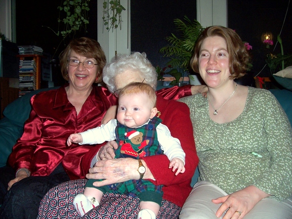 Lindsay beams from great-grandma's lap