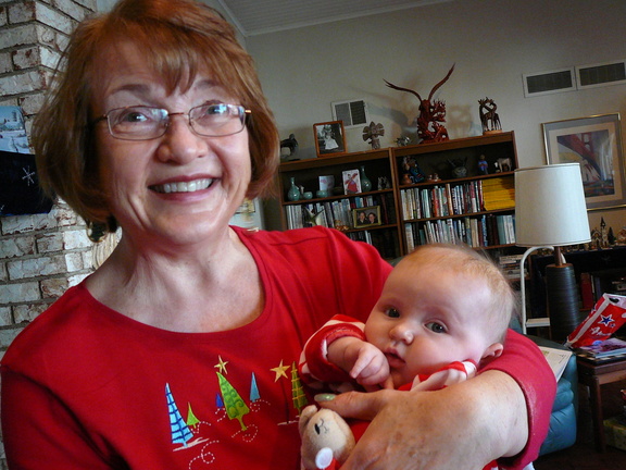 Grandma cuddles a puzzled Lindsay