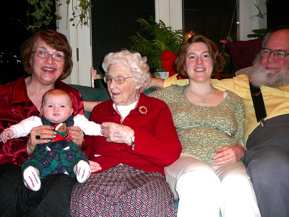 Four generations of women and one grinning patriarch