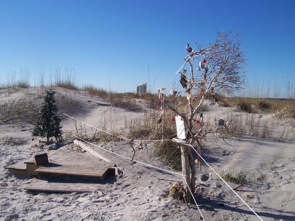 The North end of Wrightsville Beach gets dressed up for the holidays; the mailbox on the bench invites you to leave a message