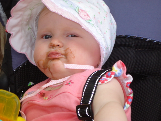 Lindsay enjoying her first ice cream at the Cincinnati zoo, May