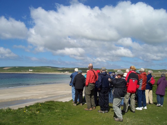 Listening to a short note on the bay at Skara Brae