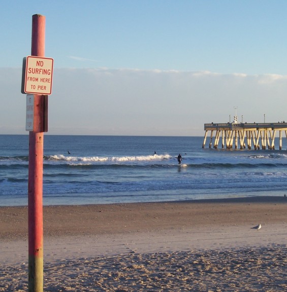 Rules are made to be broken. But don't break your neck. (Christmas, Wrightsville Beach, NC)