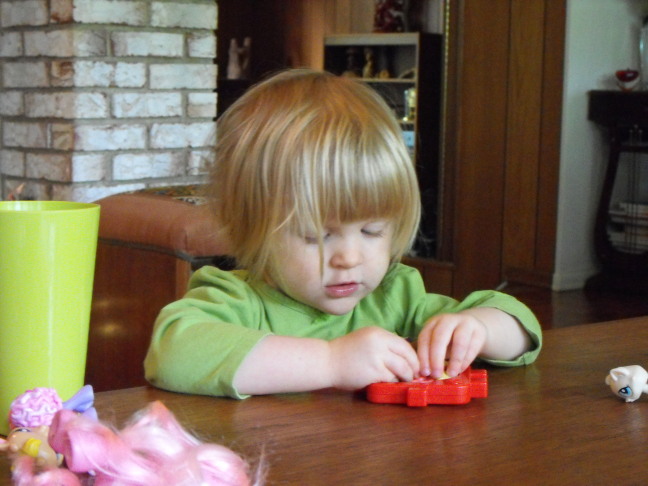  Lindsay concentrates on a puzzle