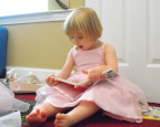  Lindsay enjoying a book at Great-grandma&s birthday party