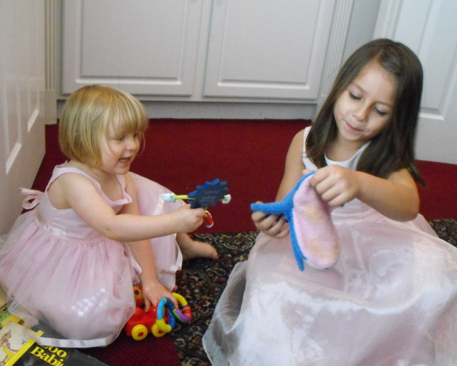  Playing with cousin Isabel at Great grandma's place