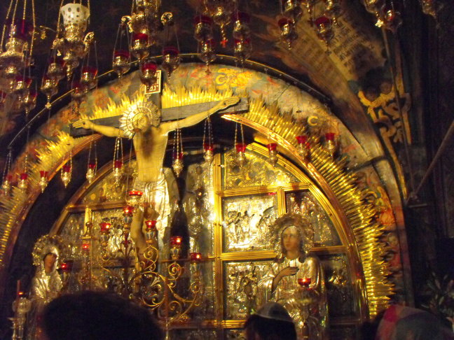  Some of the less ornate decorations in the Church of the Holy Sepulchre; lamps are everywhere