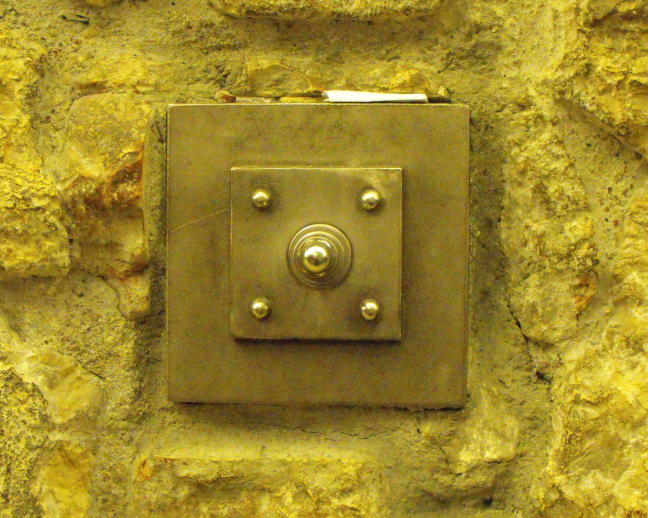  A bolt holding together the Western/Wailing Wall affords a tiny crevice for inserting a prayer