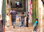  Kids stop their game to let an adult barge thorugh, Old City, Jerusalem