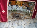  The hole looks down to the alledged site of the manger, Church of the Nativity, Bethlehem