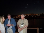  Boating across the Sea of Galilee, with the town of Tiberias under a half moon in the background