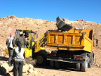  The payloader dumps its load, Petra