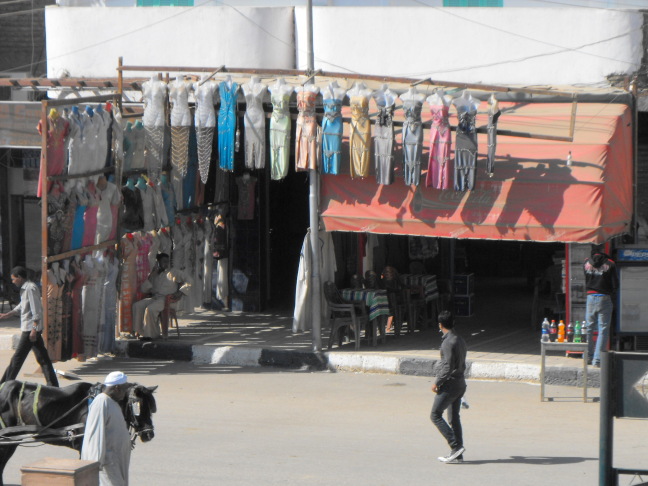  Walking past Coke and cloths, 11:03:41, Edfu