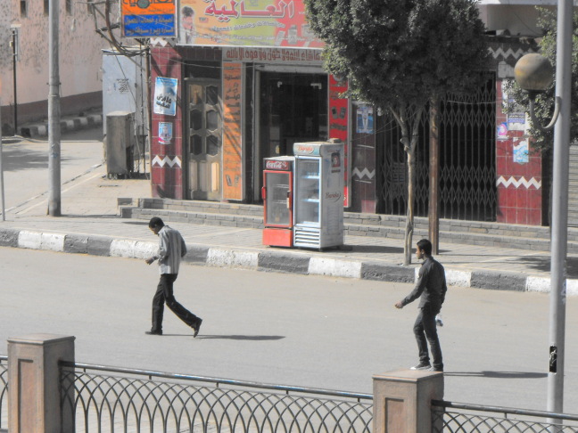  Walking past Coke -- but not cloths, 11:03:46, Edfu