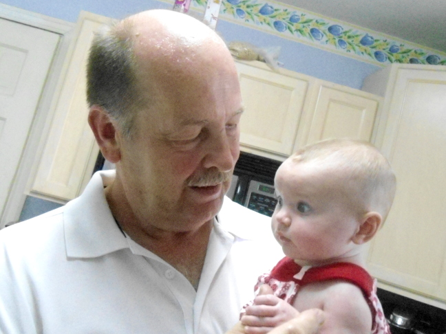  Grandpa Brian holding a skeptical Zoe