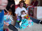  Zoe Blackall, with her dad Brian, is puzzled by a toy