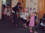  Lindsay leads leads her classmates at graduation from pre-school