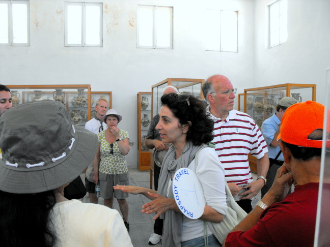  Roxannie, Fred's guide in Mykonos, describing Mykonosian history in the local museum