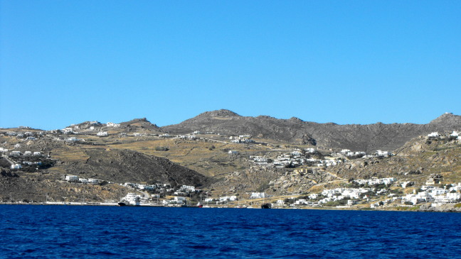  There are unbuilt areas in Mykonos, but not many trees