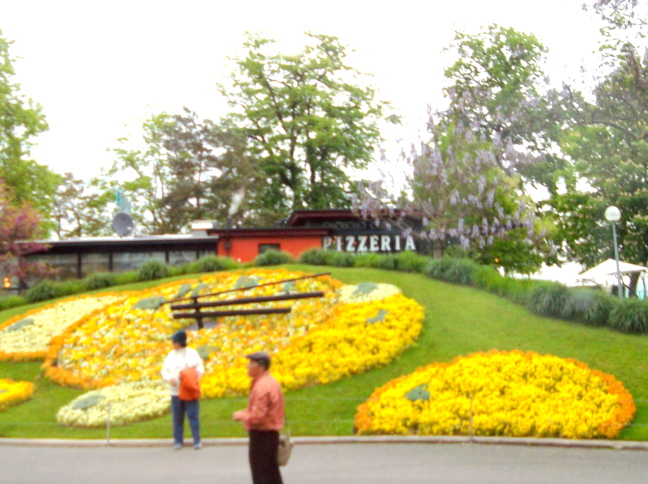  Each season the flower clock in Geneva is replanted with then-blooming flowers. All three hands keep time: hour, minute, and second.