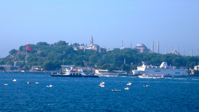  On land in European Istanbul: the Turkish flag at the Ataturk monument, Topkapi Palace, Hagia Sophia (Sacred Wisdom), and the Blue Mosque. On the waters of the Bosphorus: three of the myriad ferries, fishing boats, a yacht